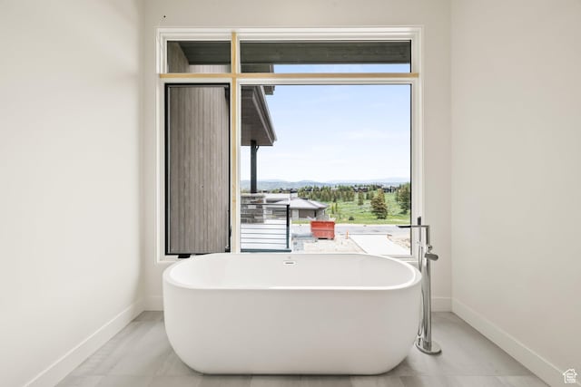 7175 Lupine Dr, Park City, UT 84098 - bathroom with a freestanding bath and baseboards