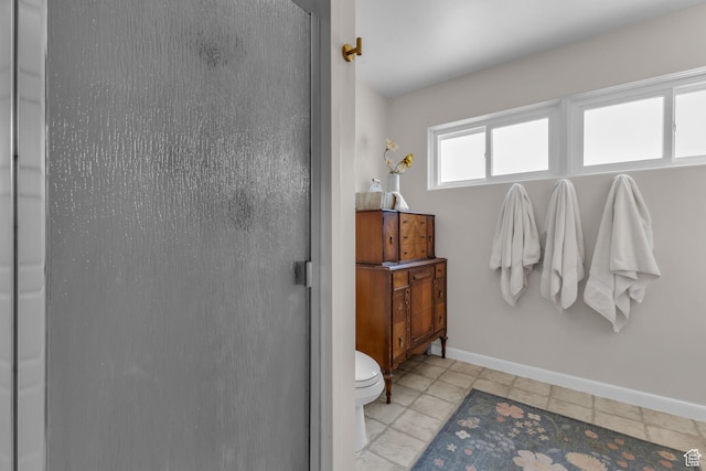 2224 N 600 W, Pleasant Grove, UT 84062 - bathroom featuring a shower stall, toilet, and baseboards
