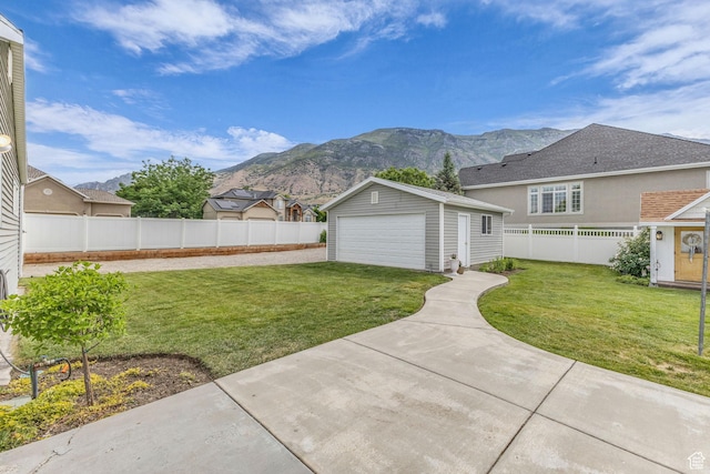2224 N 600 W, Pleasant Grove, UT 84062 - view of yard with a mountain view, an outdoor structure, a garage, and a patio area