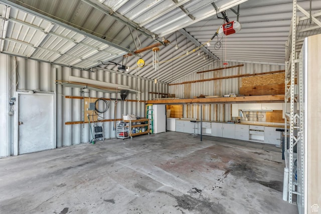 2224 N 600 W, Pleasant Grove, UT 84062 - garage featuring a garage door opener and metal wall