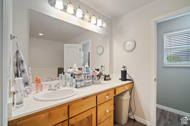 787 N 500 W, Brigham City, UT 84302 - bathroom featuring vanity, wood finished floors, and baseboards
