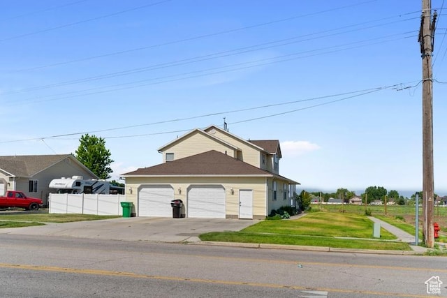 787 N 500 W, Brigham City, UT 84302 - view of front of home featuring concrete driveway and an attached garage