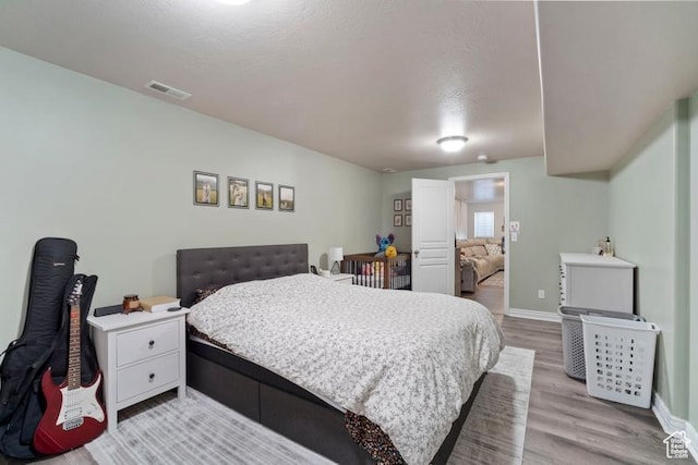 787 N 500 W, Brigham City, UT 84302 - bedroom featuring light wood-style floors and baseboards