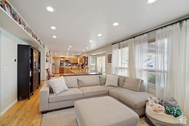 787 N 500 W, Brigham City, UT 84302 - living area featuring recessed lighting, light wood finished floors, and baseboards
