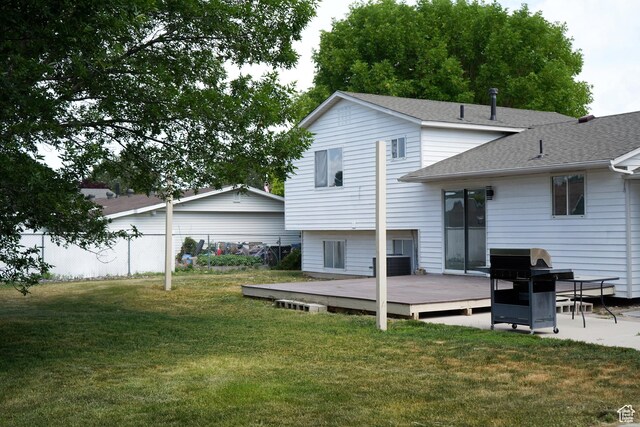 1102 E 120 S, Spanish Fork, UT 84660 - rear view of property featuring a deck, roof with shingles, and central AC