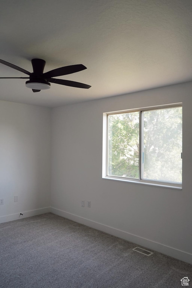 1102 E 120 S, Spanish Fork, UT 84660 - unfurnished room featuring ceiling fan, baseboards, and carpet flooring