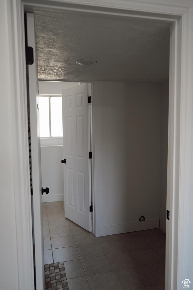 1102 E 120 S, Spanish Fork, UT 84660 - tiled empty room featuring baseboards