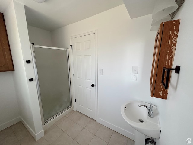 1102 E 120 S, Spanish Fork, UT 84660 - bathroom featuring tile patterned floors, baseboards, and a shower stall
