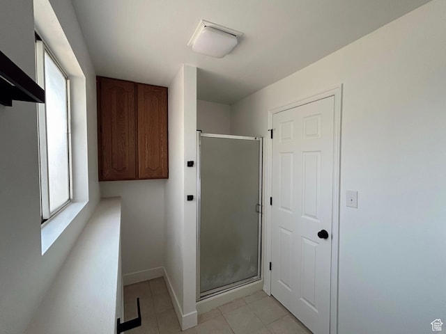 1102 E 120 S, Spanish Fork, UT 84660 - laundry area with light tile patterned flooring and baseboards