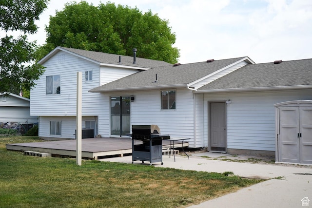 1102 E 120 S, Spanish Fork, UT 84660 - rear view of house with a deck, roof with shingles, and a yard