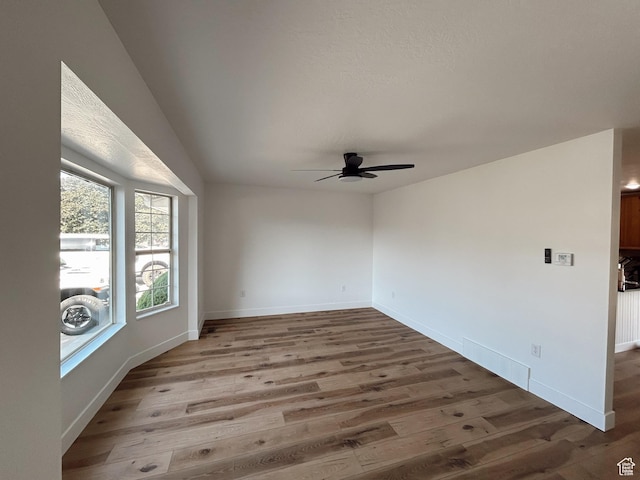 1102 E 120 S, Spanish Fork, UT 84660 - empty room with a ceiling fan, wood finished floors, and baseboards