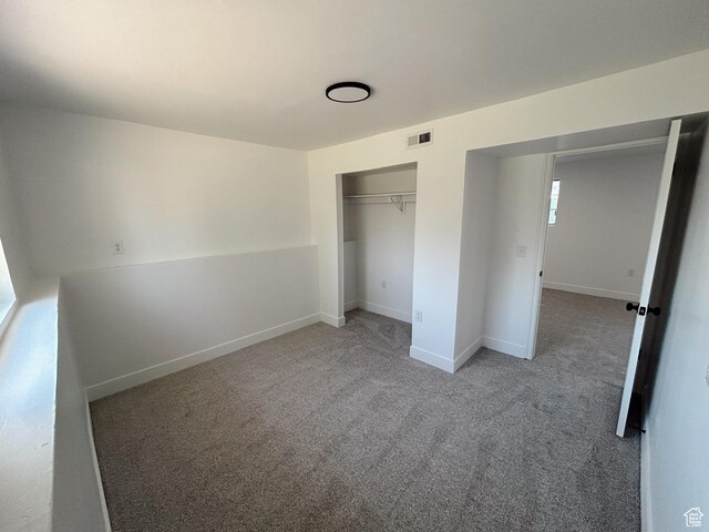 1102 E 120 S, Spanish Fork, UT 84660 - unfurnished bedroom featuring carpet flooring, a closet, and baseboards