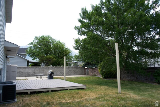 1102 E 120 S, Spanish Fork, UT 84660 - view of yard with central air condition unit and a deck