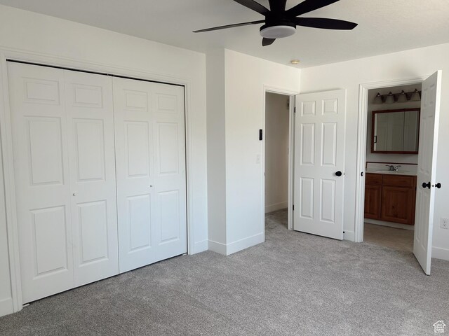 1102 E 120 S, Spanish Fork, UT 84660 - unfurnished bedroom with light colored carpet, a closet, baseboards, ensuite bath, and ceiling fan