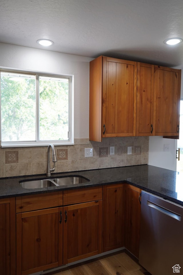 1102 E 120 S, Spanish Fork, UT 84660 - kitchen with stainless steel dishwasher, a sink, and brown cabinetry