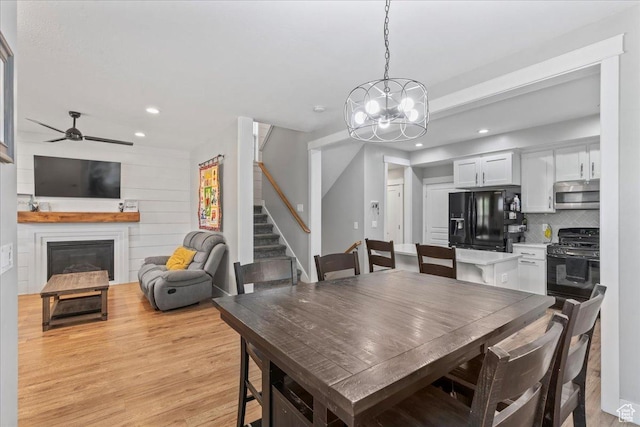 826 W 2630 N, Lehi, UT 84043 - dining room with stairs, light wood-style floors, recessed lighting, a chandelier, and ceiling fan