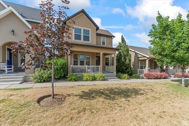 826 W 2630 N, Lehi, UT 84043 - view of front facade with a porch, stucco siding, and a front yard