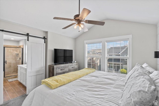826 W 2630 N, Lehi, UT 84043 - bedroom featuring a barn door, wood finished floors, vaulted ceiling, ceiling fan, and connected bathroom
