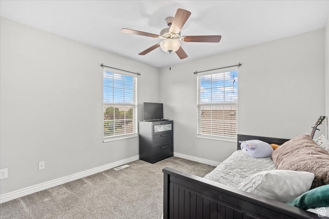 826 W 2630 N, Lehi, UT 84043 - bedroom with multiple windows, light carpet, baseboards, and a ceiling fan
