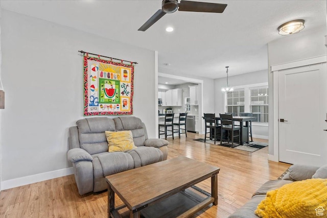 826 W 2630 N, Lehi, UT 84043 - living area with ceiling fan, baseboards, light wood-style flooring, a chandelier, and recessed lighting