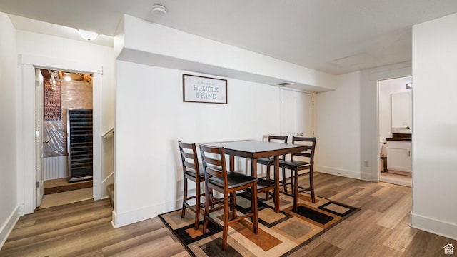 4475 S Lochnivar Ct E, Millcreek, UT 84107 - dining area featuring wood finished floors and baseboards