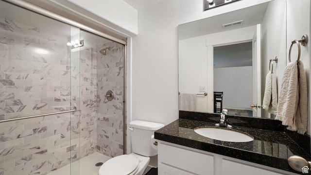 4475 S Lochnivar Ct E, Millcreek, UT 84107 - bathroom featuring vanity, a stall shower, and toilet