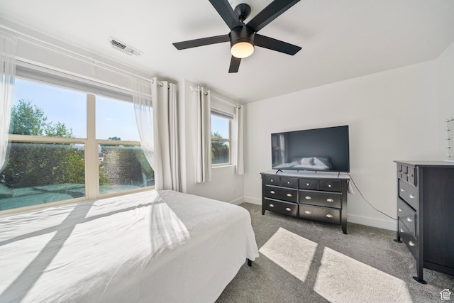 4475 S Lochnivar Ct E, Millcreek, UT 84107 - carpeted bedroom with baseboards and ceiling fan