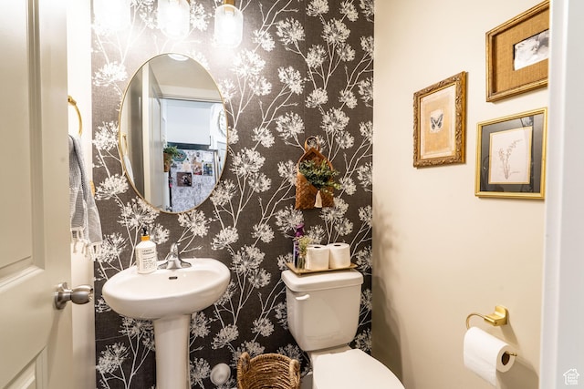 3133 S 350 W, Nibley, UT 84321 - half bathroom featuring wallpapered walls and toilet