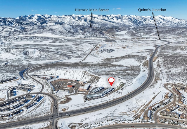 1200 W Lori Ln Unit B7, Kamas, UT 84036 - snowy aerial view featuring a mountain view