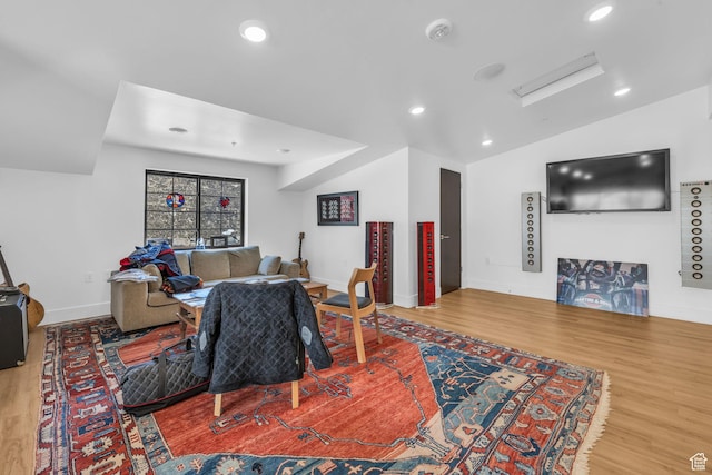 1200 W Lori Ln Unit B7, Kamas, UT 84036 - living area with wood finished floors, baseboards, recessed lighting, attic access, and lofted ceiling