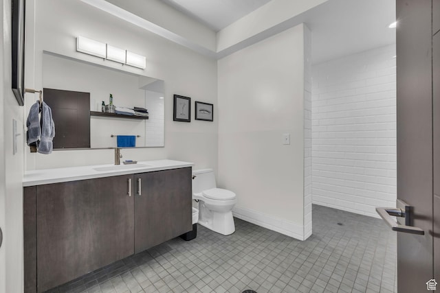 1200 W Lori Ln Unit B7, Kamas, UT 84036 - bathroom featuring toilet, vanity, tile patterned floors, and baseboards