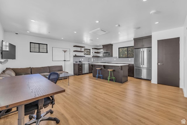 1200 W Lori Ln Unit B7, Kamas, UT 84036 - living area featuring light wood finished floors and recessed lighting