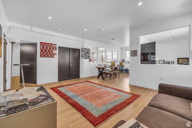 1200 W Lori Ln Unit B7, Kamas, UT 84036 - living room with light wood-style flooring, recessed lighting, and baseboards
