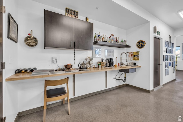 1200 W Lori Ln Unit B7, Kamas, UT 84036 - bar featuring a sink and baseboards