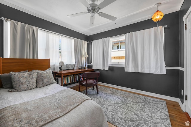 525 E St, Salt Lake City, UT 84103 - bedroom with wood finished floors, multiple windows, ornamental molding, and baseboards