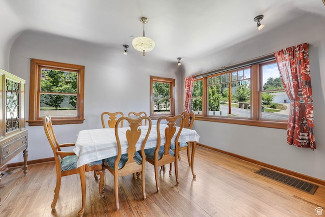 525 E St, Salt Lake City, UT 84103 - dining room featuring baseboards and light wood-type flooring