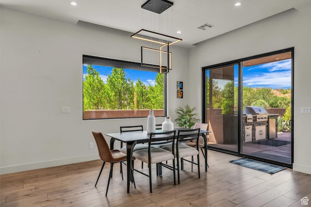 2304 N Cohonina Trl, St George, UT 84770 - dining area with hardwood / wood-style flooring, baseboards, plenty of natural light, and recessed lighting