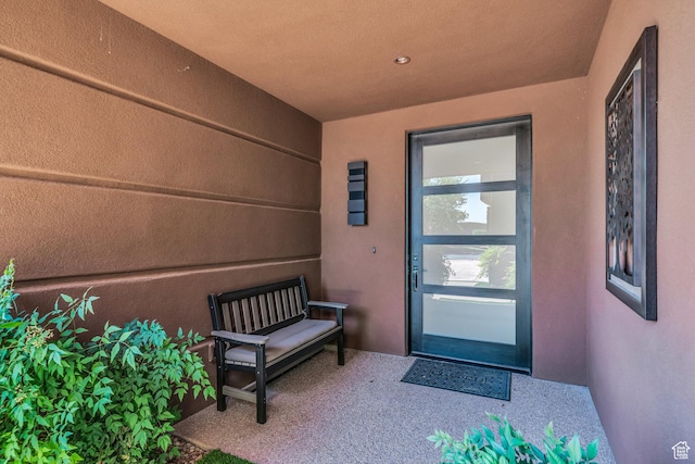 2304 N Cohonina Trl, St George, UT 84770 - doorway to property featuring stucco siding