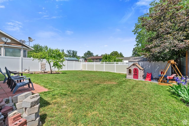 6097 S Azure Meadow Dr, Taylorsville, UT 84129 - view of yard featuring a patio