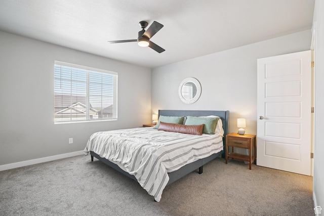 1123 W Osprey Dr, Stansbury Park, UT 84074 - carpeted bedroom featuring baseboards and a ceiling fan
