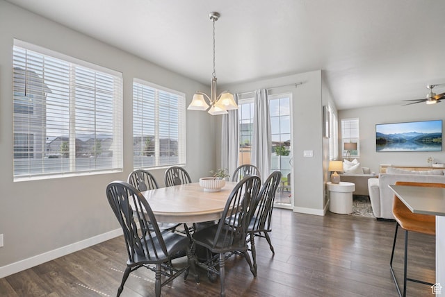 1123 W Osprey Dr, Stansbury Park, UT 84074 - dining area featuring baseboards, dark wood finished floors, a chandelier, and ceiling fan