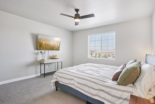 1123 W Osprey Dr, Stansbury Park, UT 84074 - carpeted bedroom featuring baseboards and a ceiling fan