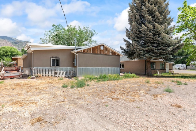 195 S 200 E, Monroe, UT 84754 - view of front of home featuring a mountain view and stucco siding