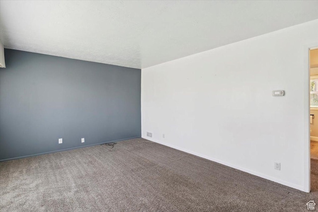 630 Polk Ave, Ogden, UT 84404 - carpeted spare room with baseboards