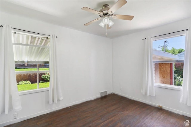 630 Polk Ave, Ogden, UT 84404 - unfurnished room featuring dark wood-style flooring, baseboards, and a ceiling fan