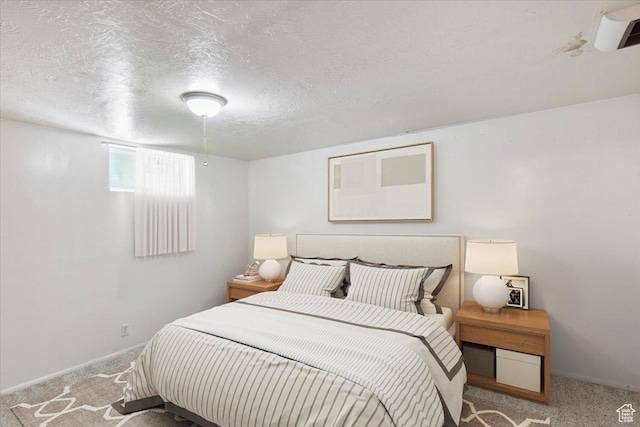 630 Polk Ave, Ogden, UT 84404 - carpeted bedroom with a textured ceiling and baseboards