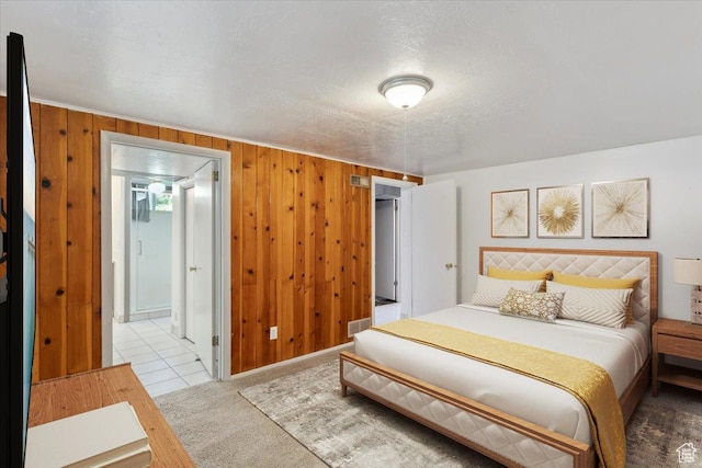 630 Polk Ave, Ogden, UT 84404 - carpeted bedroom with wooden walls and a textured ceiling