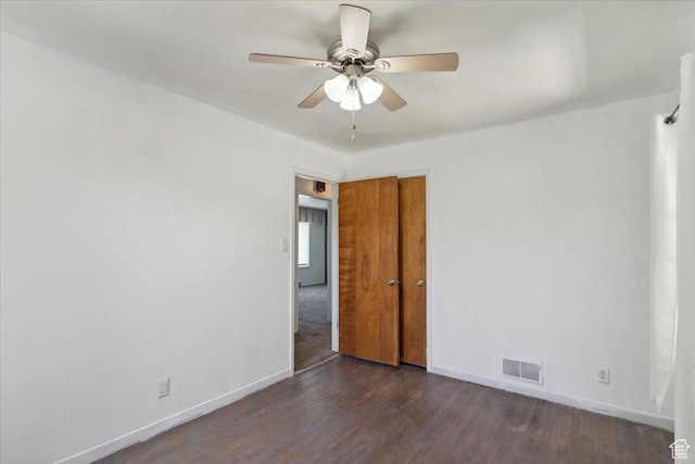 630 Polk Ave, Ogden, UT 84404 - unfurnished room featuring baseboards, a ceiling fan, and dark wood-style floors