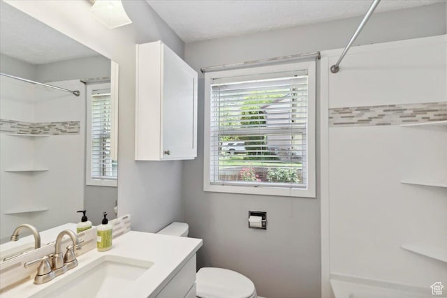 630 Polk Ave, Ogden, UT 84404 - bathroom with a shower, toilet, and vanity
