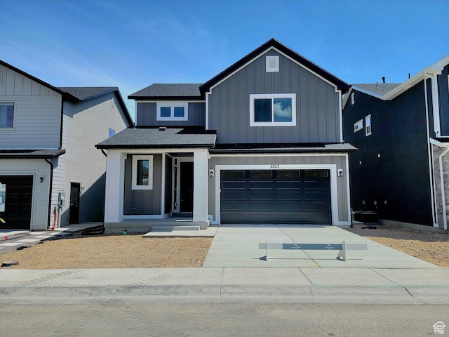 6723 S Glade Creek Dr Unit 223, West Jordan, UT 84081 - traditional-style home featuring board and batten siding, concrete driveway, an attached garage, and a shingled roof